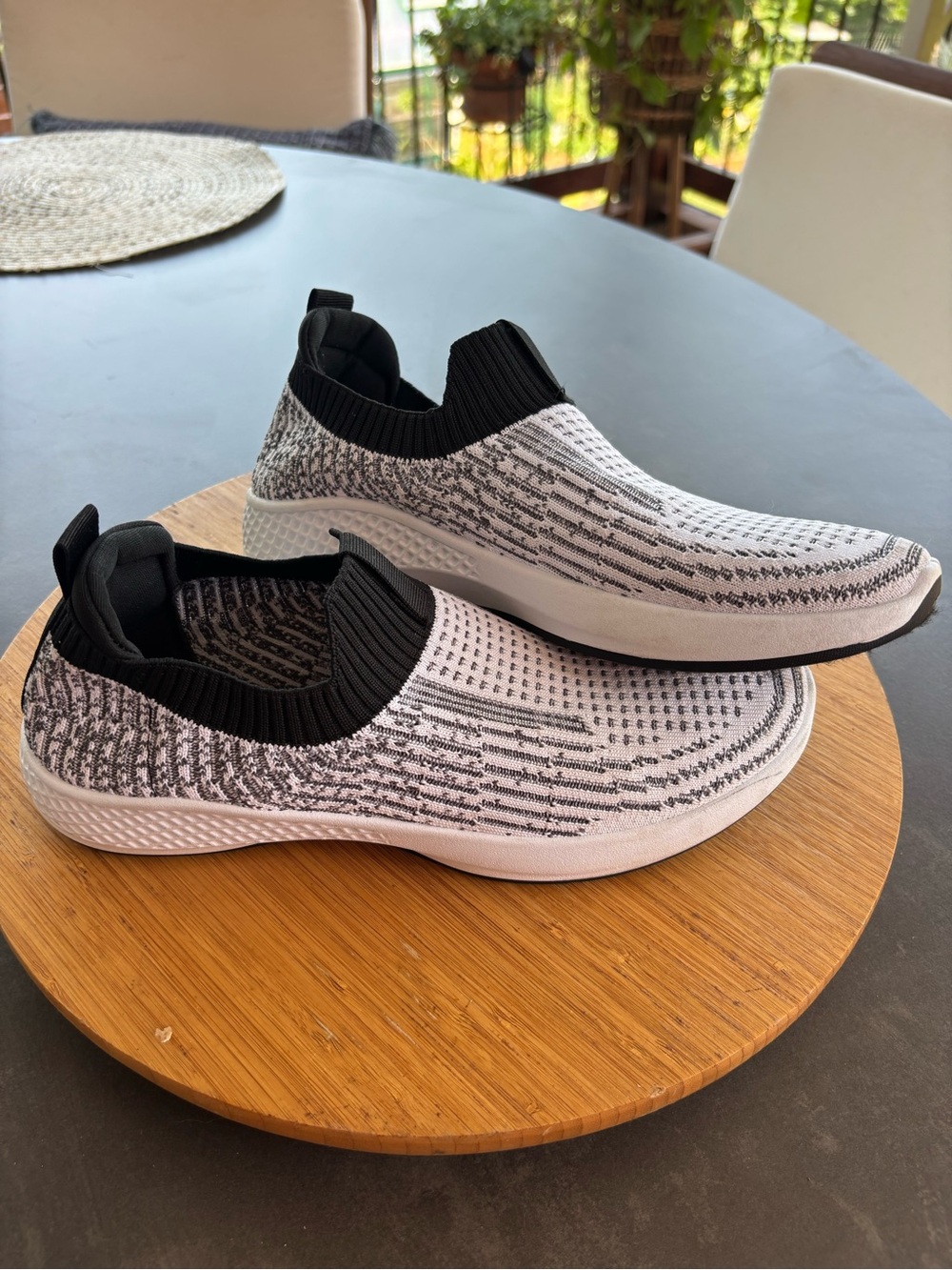 Tommy Bahama Slip-On Knit Athletic Sneakers in White and Black.